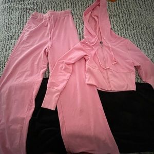NEW and NEVER WORN Pink Tracksuit. Is only a set purchase. Could fit as a S or M